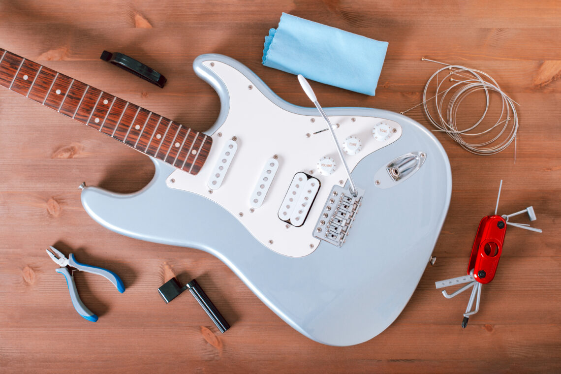 electric-guitar-body-new-strings-and-guitar-tool-2023-11-27-05-26-33-utc